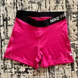 Pink Nike Pro shorts